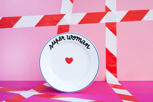 Het gezin vermaakt zich kostelijk - Super Woman-bord