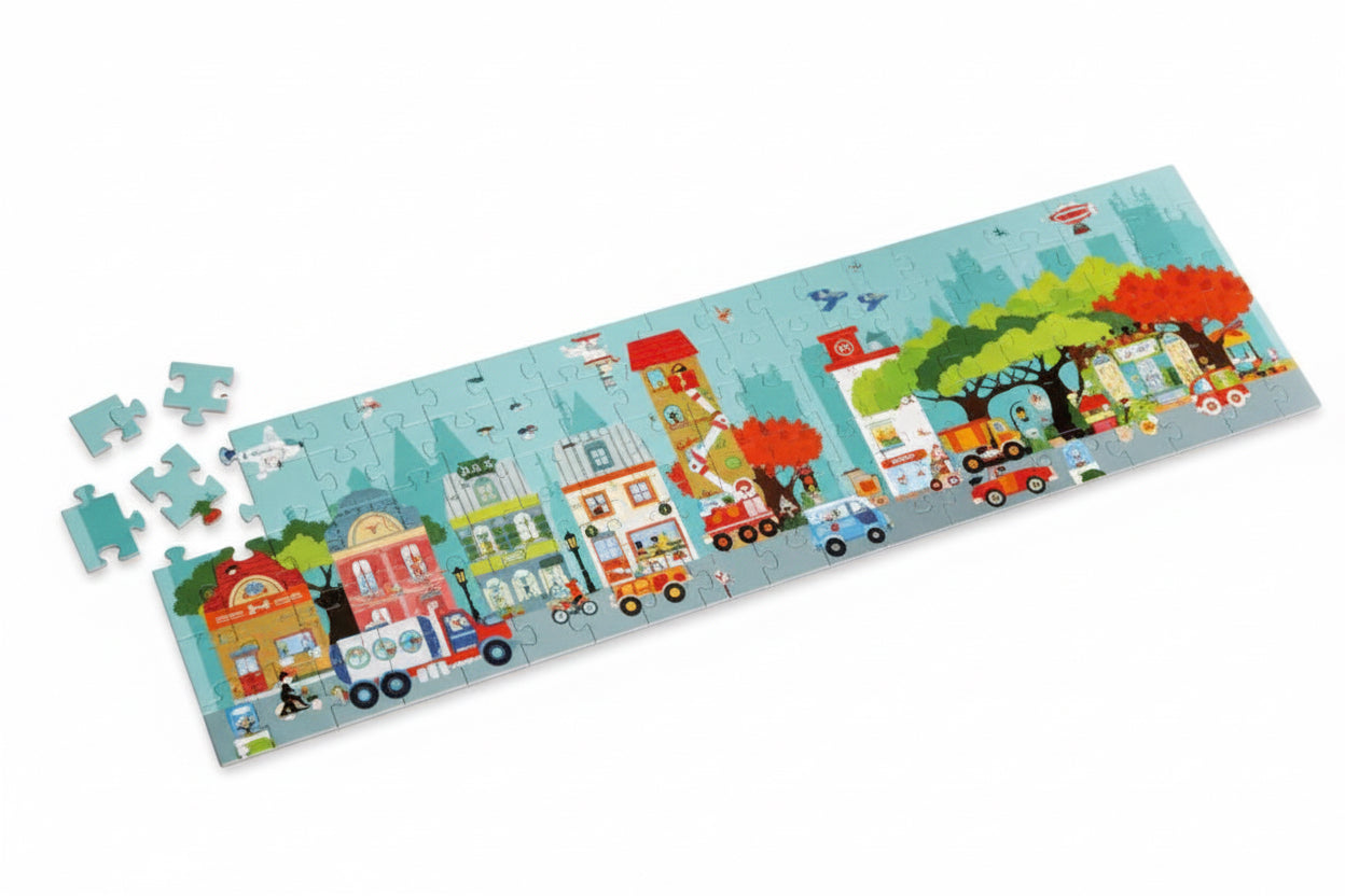 Scratch Puzzle 100pcs: PUZZLE DE SOL/VILLE 120x32cm, en boîte diam.26xH12cm, 5+