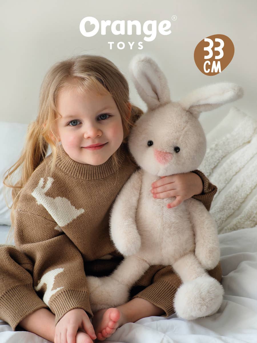 Lapin en peluche blanc - 33 cm