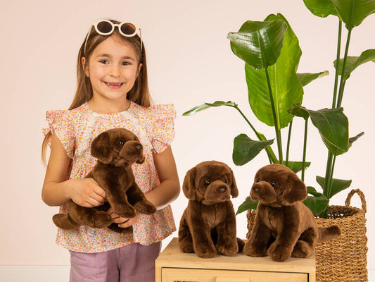 Dark brown sitting Labrador plush toy