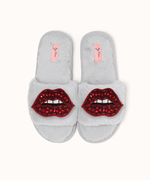 Paar slippers/lipbroches