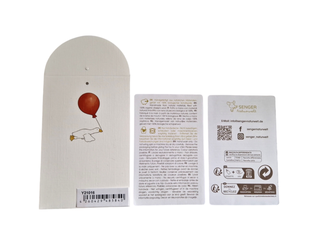 Kleine beige warmwaterkruik in de vorm van een konijn.