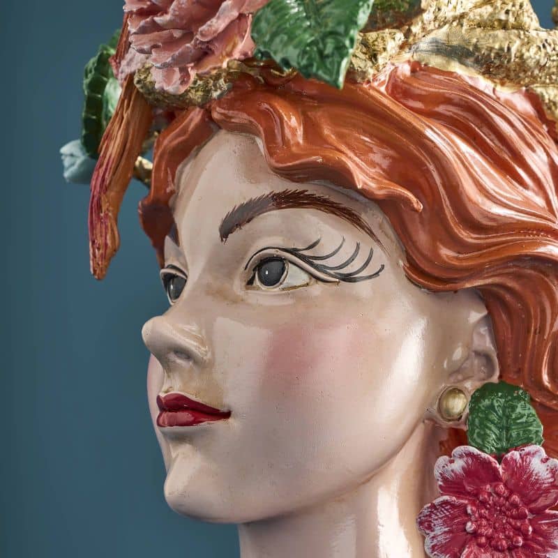 Vase with a woman's head by M. Parrots