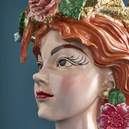 Vase with a woman's head by M. Parrots