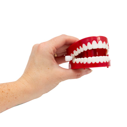 TEETH THAT CLICK LIKE A CLOCK