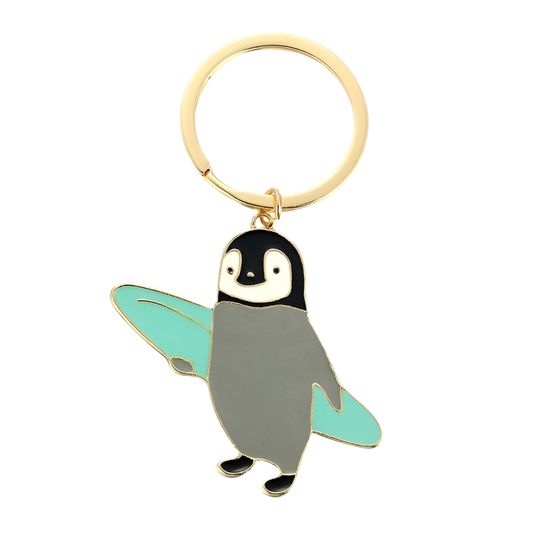 porte cles pingouin surfeur