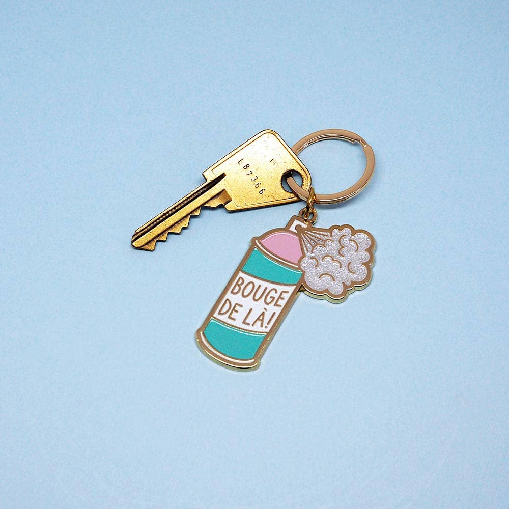 Sleutelhanger met de tekst "Verhuis hier weg"