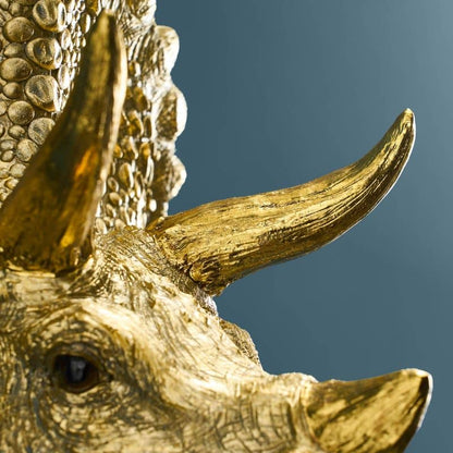 Triceratops Cera Gold wandlamp, hars, 31,5 x 28,5 cm