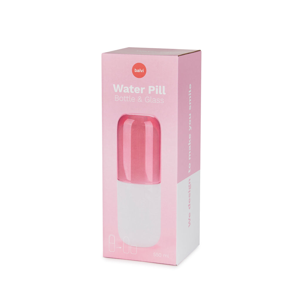 Bouteille de pilules d'eau et verre à boire