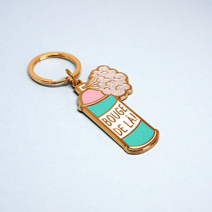 Sleutelhanger met de tekst "Verhuis hier weg"