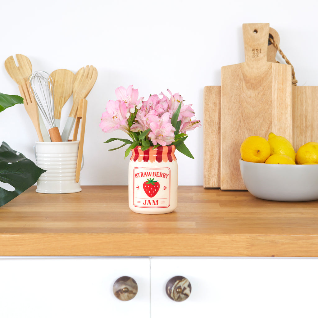 Mini vase de confiture de fraises