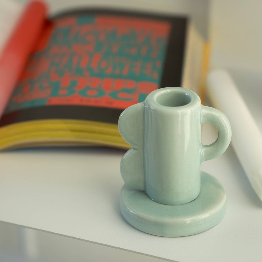 Lichtblauwe vintage kaarsenhouder met golvenmotief