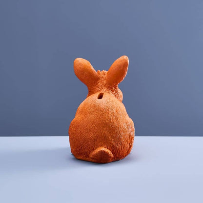Lapin économe, résine polyuréthane orange, 21 x 11 x 16 cm
