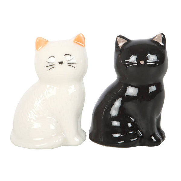 Porte-bonheur chats blancs et noirs