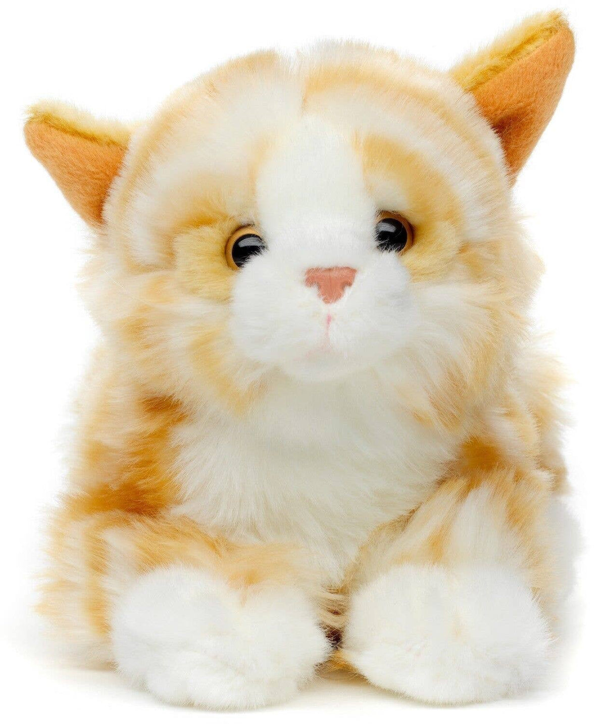 Plush lying cat with brown teeth