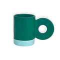 Groene keramische mok