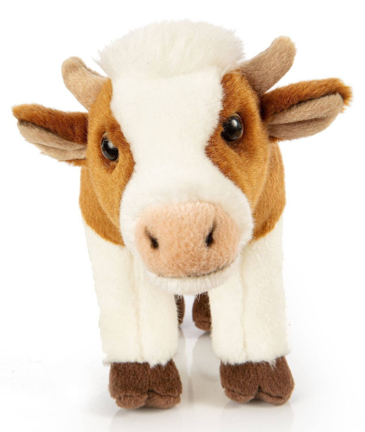 Standing white and brown cow plush toy