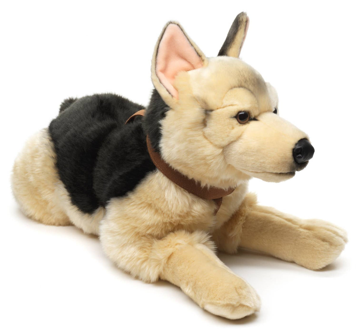Plush German Shepherd lying down with harness