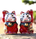 Daruma gelukskat aardewerken beeldje