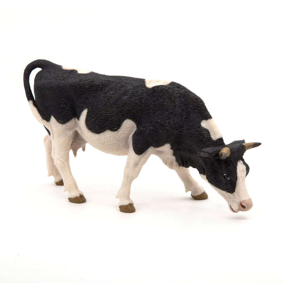 Grazing Black and White Cow Figurine
