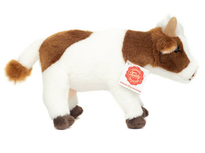 Brown and white cow plush toy