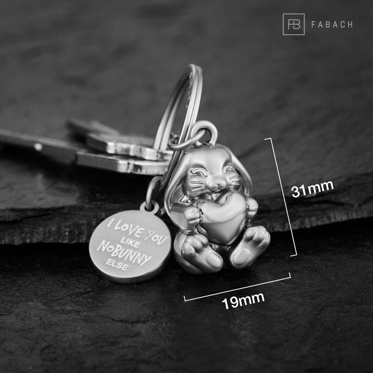 "I love you like no bunny else" bunny-shaped keychain with engraving. Cute lucky charm with a heart