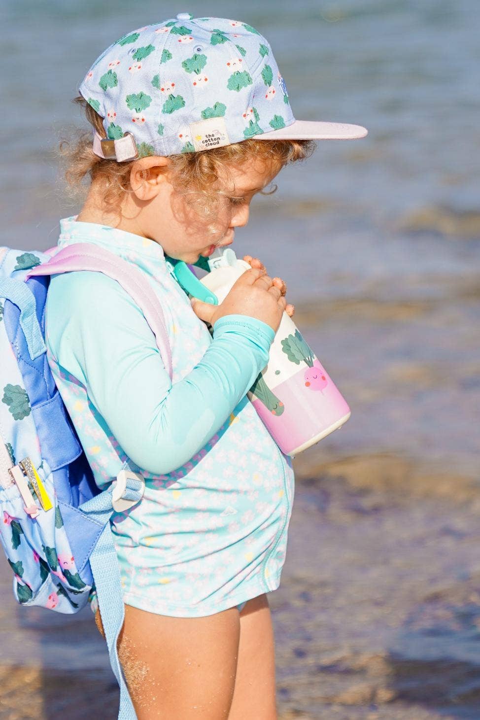 Geïsoleerde waterfles van roestvrij staal voor kinderen met dansende hartjes.