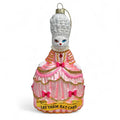 Kerstbal met een witte kat genaamd Marie Antoinette, "Laat ze eten".