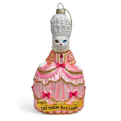 Kerstbal met een witte kat genaamd Marie Antoinette, "Laat ze eten".