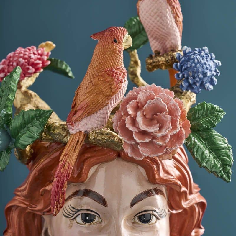 Vase with a woman's head by M. Parrots