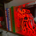 Panneau de Boîte en Néon 'Bookcase Man