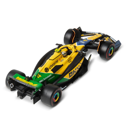 1:43 F1 MCLAREN MCL38 2024 AVEC CASQUE NORRIS SENNA LIVRAISON