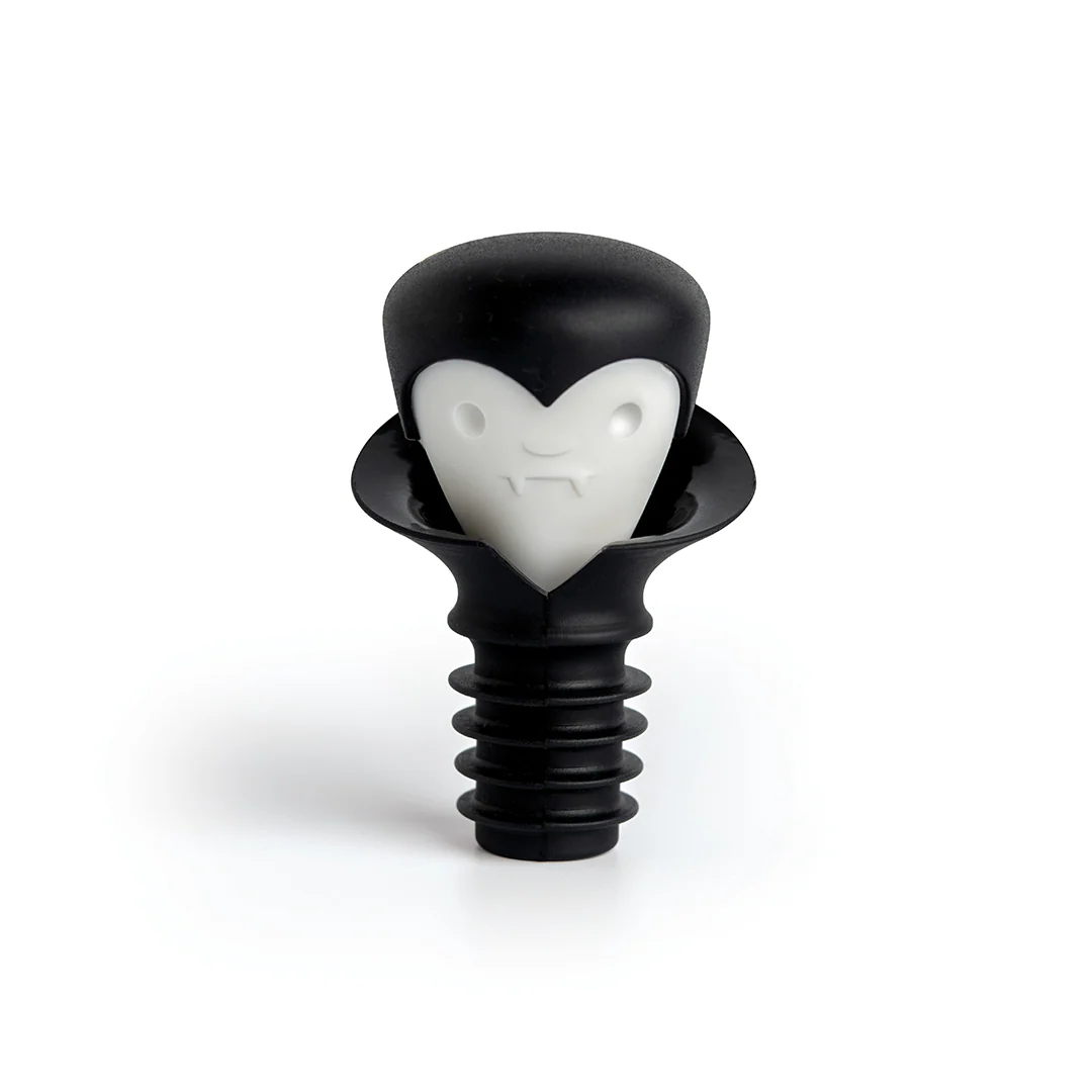 Meet Count Corkula, the black and white vampire bottle stopper with a cartoon face and fangs.