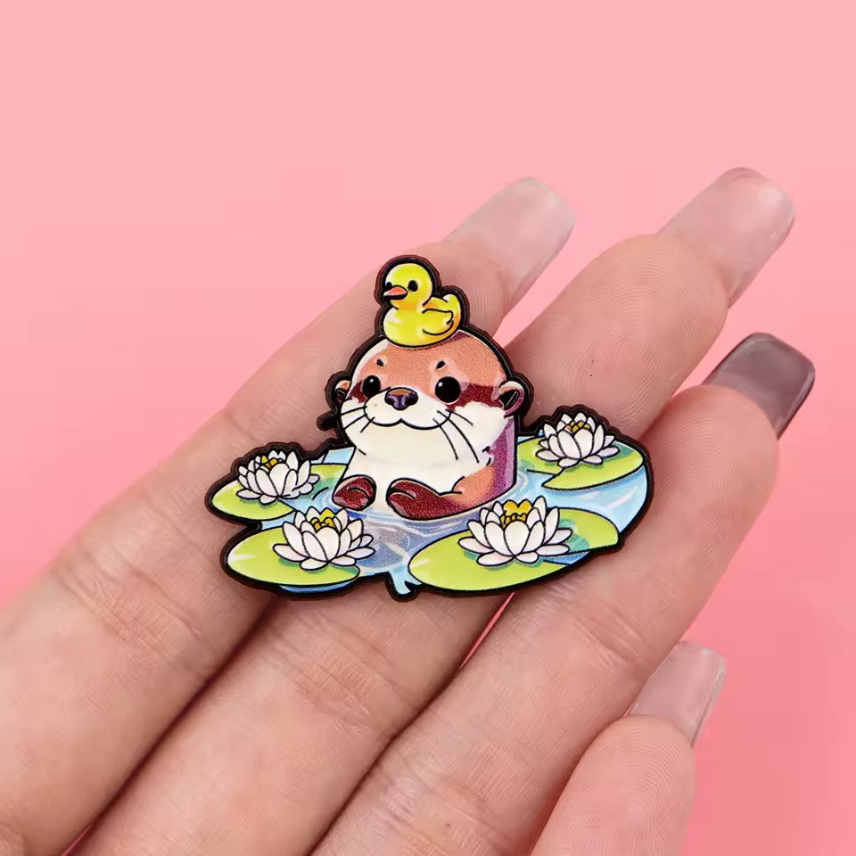 Otter and Duckling on Water Lilies Pin