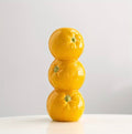 Vase of Oranges