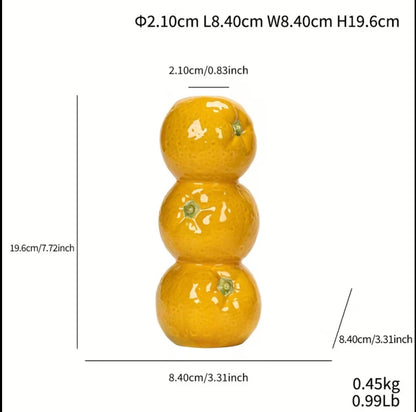 vaas met sinaasappels