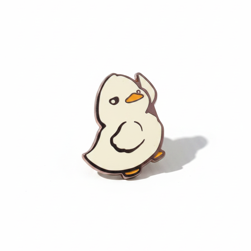 Pin's Canard Blanc avec Couteau - photo produit
