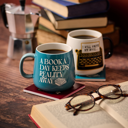 "A Book A Day Keeps Reality Away" Oval Mug – 370 ml