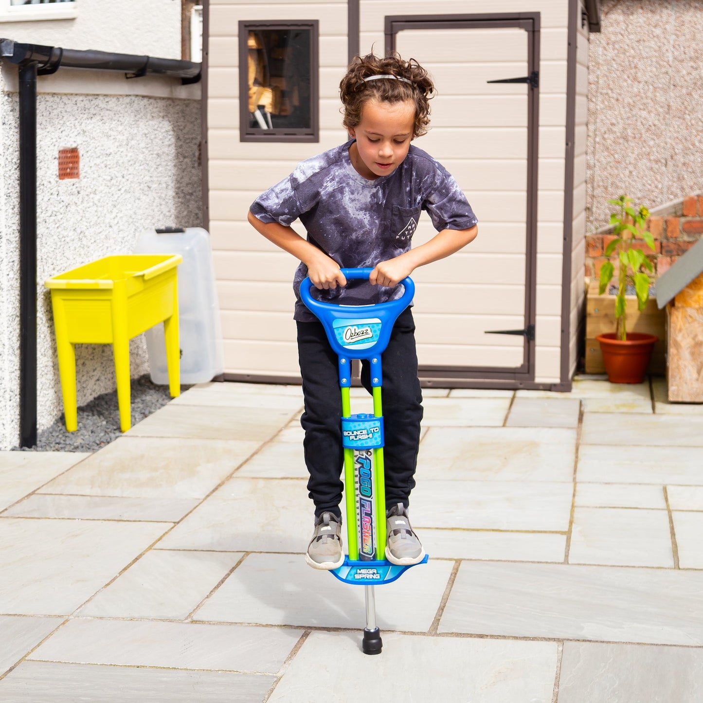 BLUE LIGHT-UP POGO STICK 89CM
