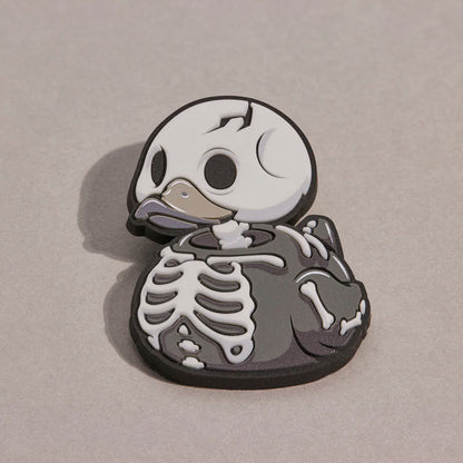 TUBBZ Numskull Skelett – Leuchtender Gummi-Pin