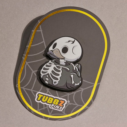 TUBBZ Numskull Skelett – Leuchtender Gummi-Pin