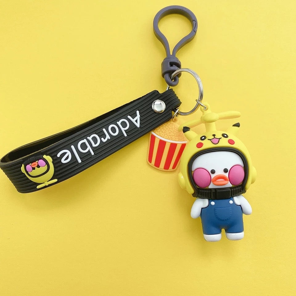 Sleutelhanger kawaii-eend met motorhelm