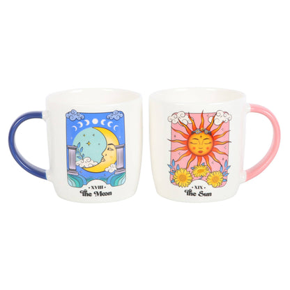 Set hemelse mokken met zon- en maanmotief.