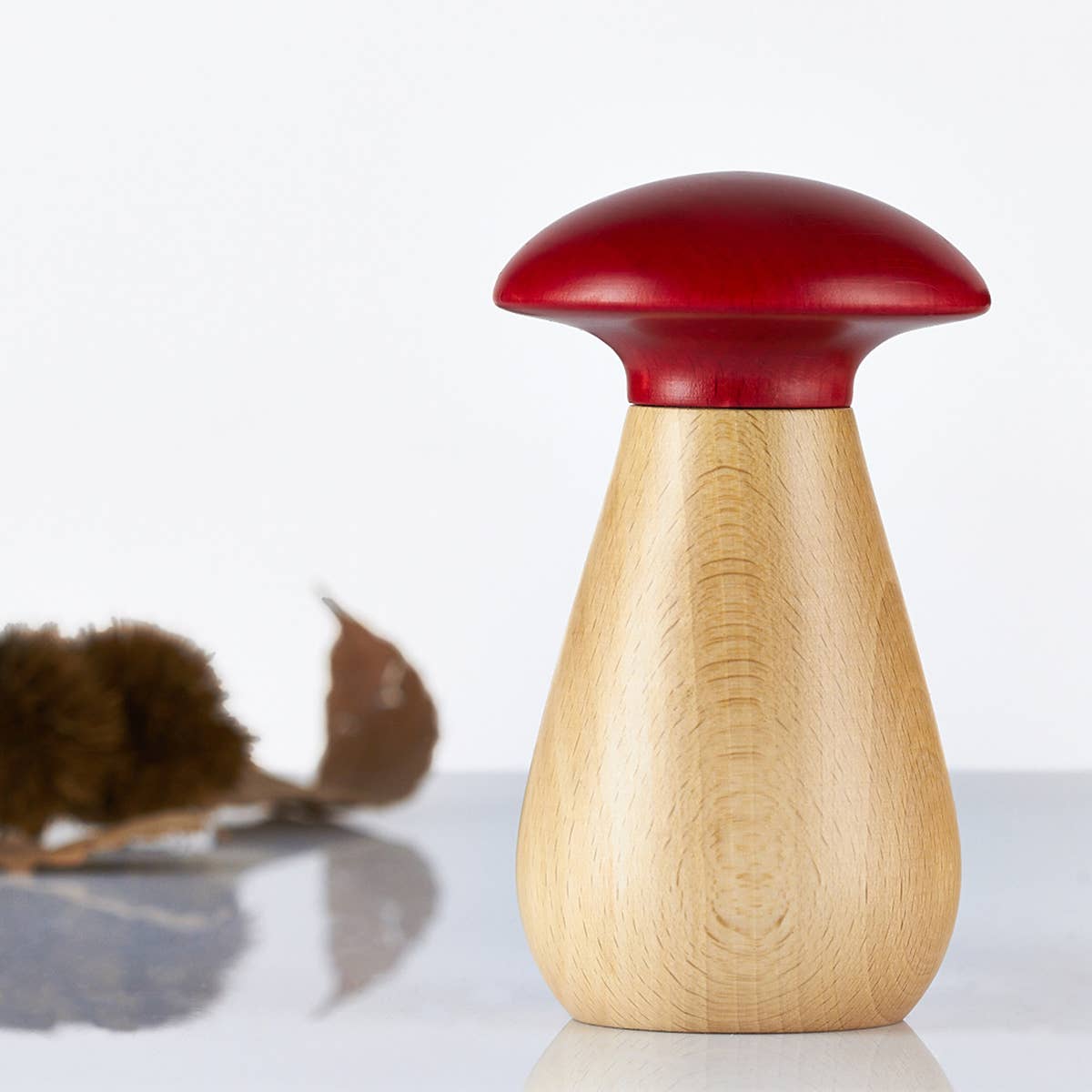 "Mushrooms" spice mill in natural beech with a red top