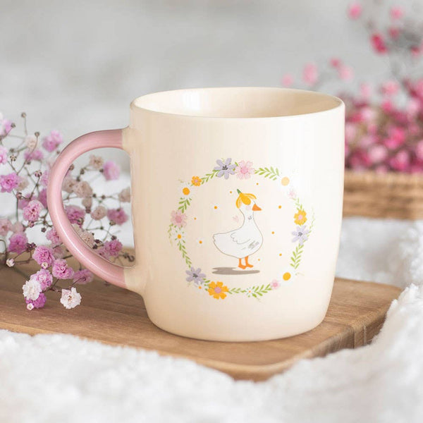 Mok met bloemenmotief en eendje