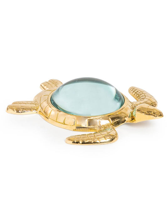 Large brass magnifying glass in the shape of a turtle