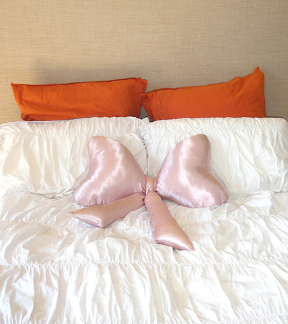 Satin knot cushion