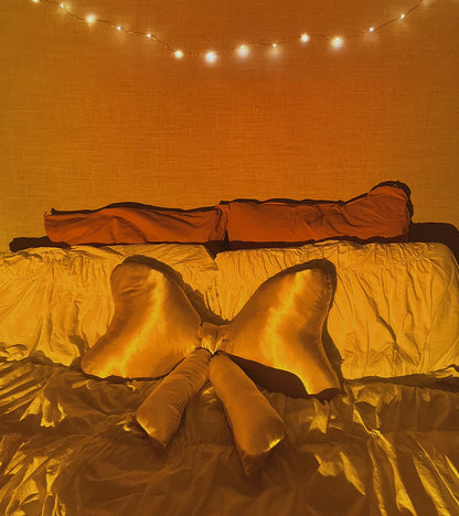 Satin knot cushion