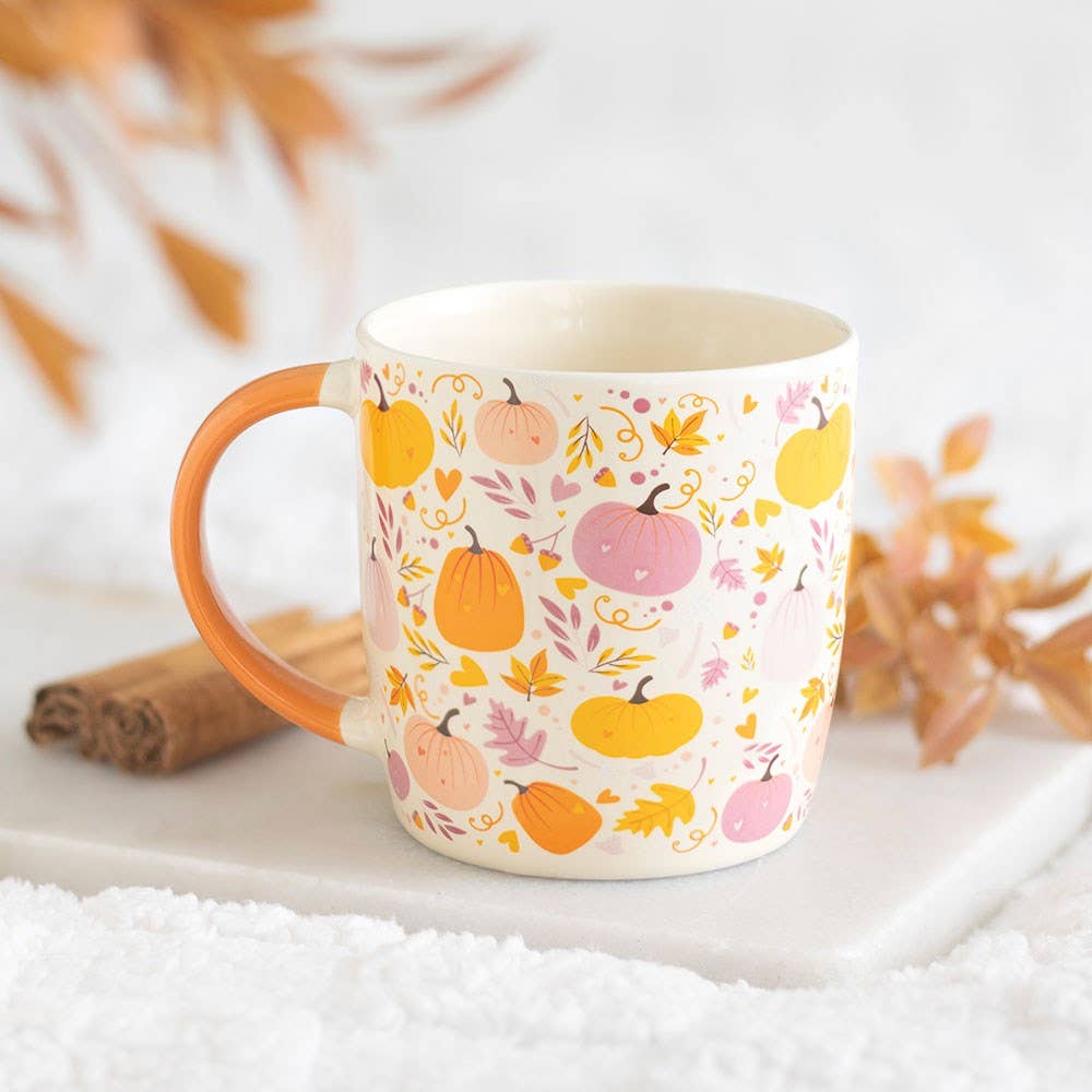 Autumn mug with pink and orange pumpkin design
