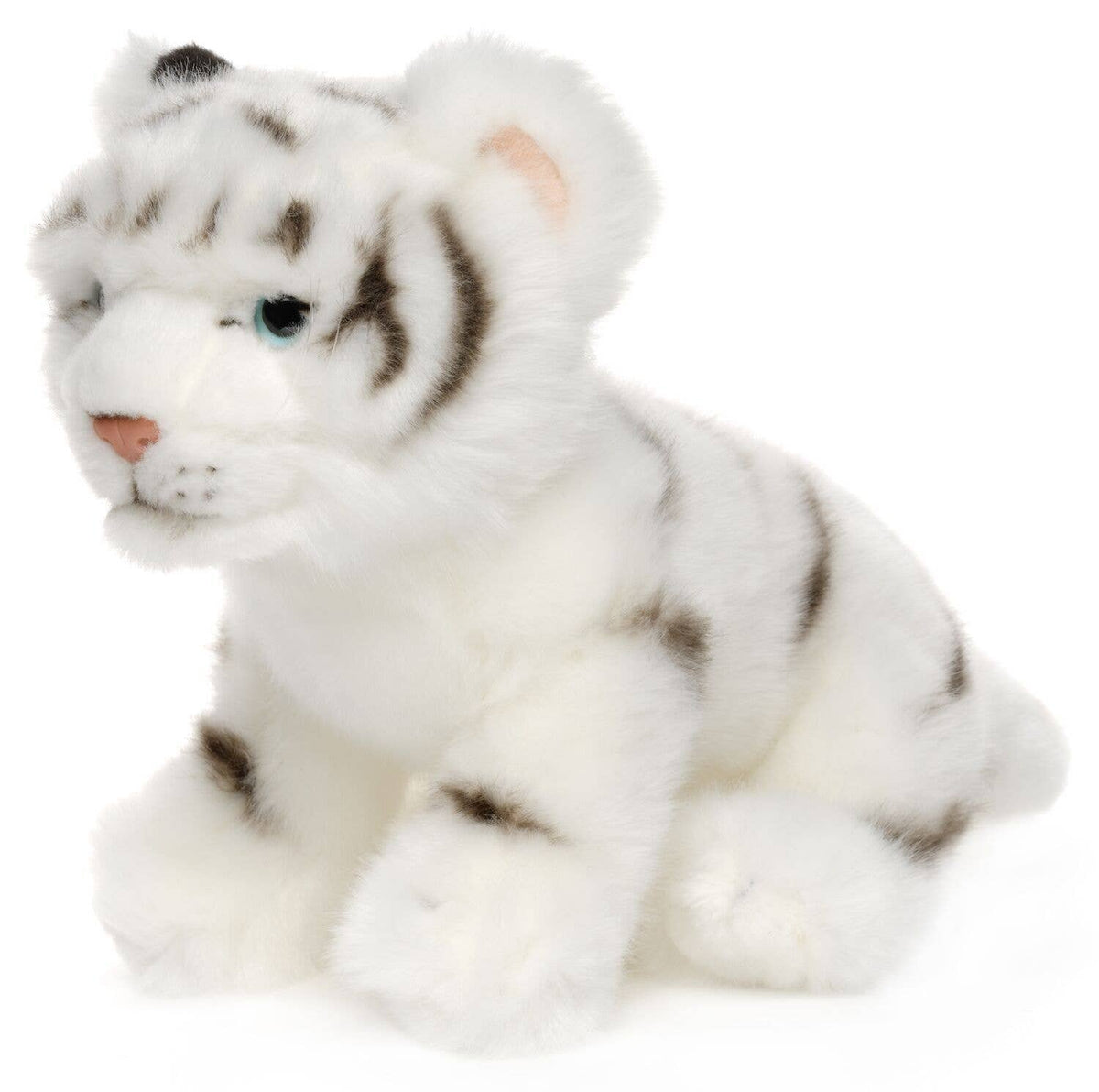 Plush white tiger cub, sitting